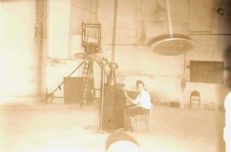 The control station during experiments — a disc visible in flight at upper right