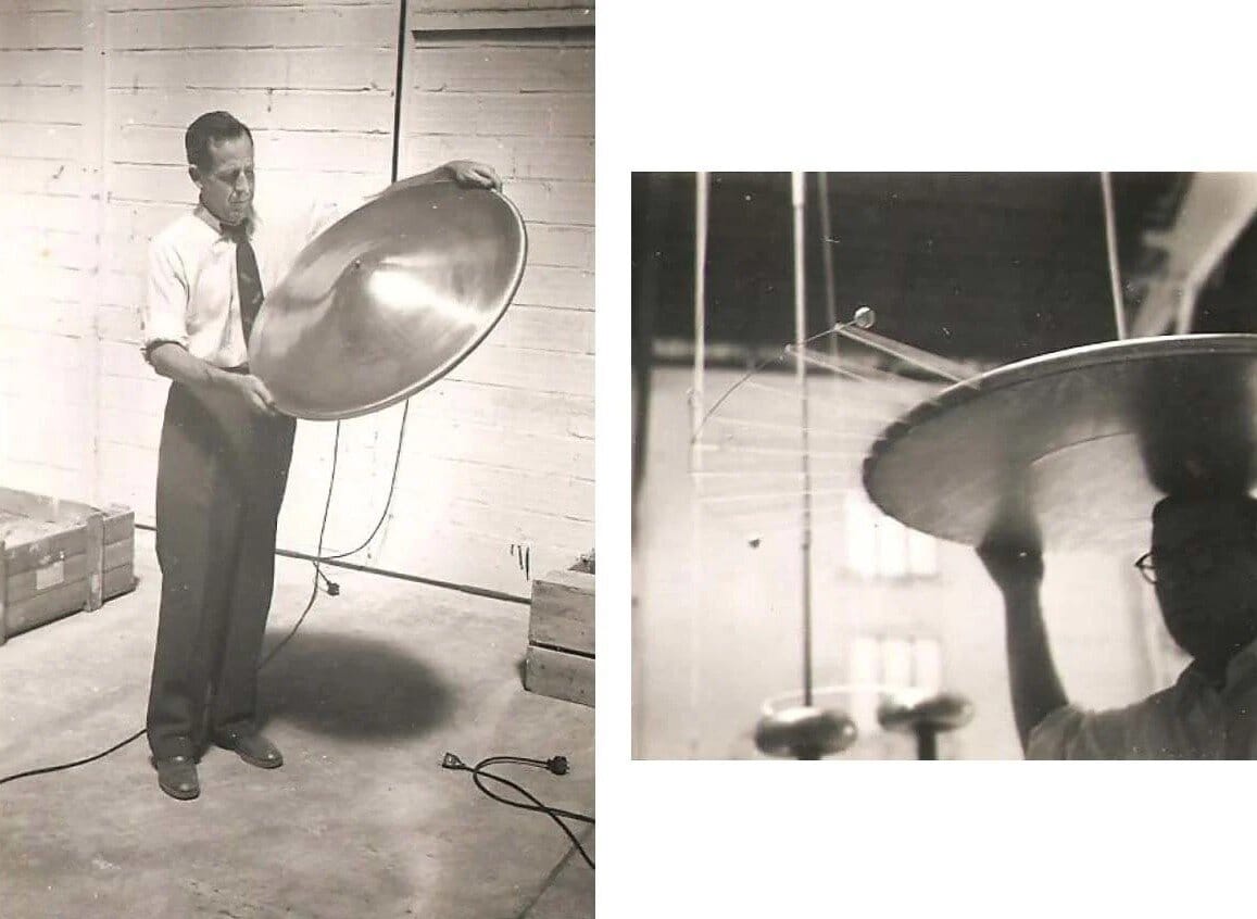 Brown demonstrating his disc and a disc suspended for high-voltage testing